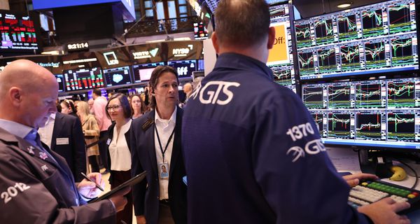  Traders work on the floor of the New York Stock Exchange