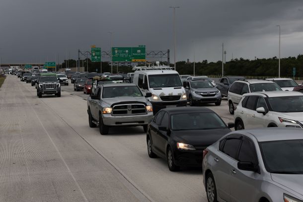 People in cars evacuating St. Petersburg, Florida, on Monday before Hurricane Milton makes landfall